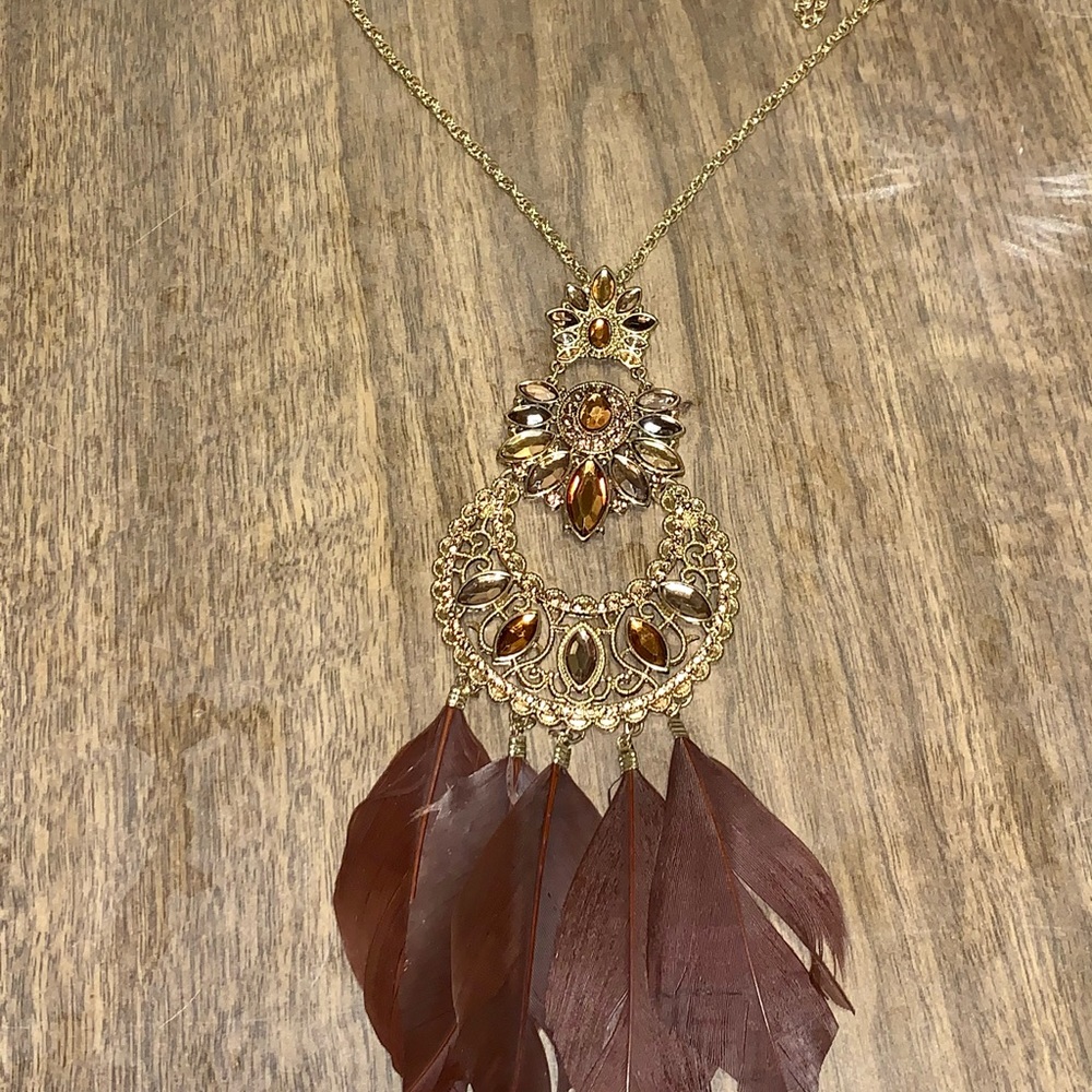 Gold feather statement necklace